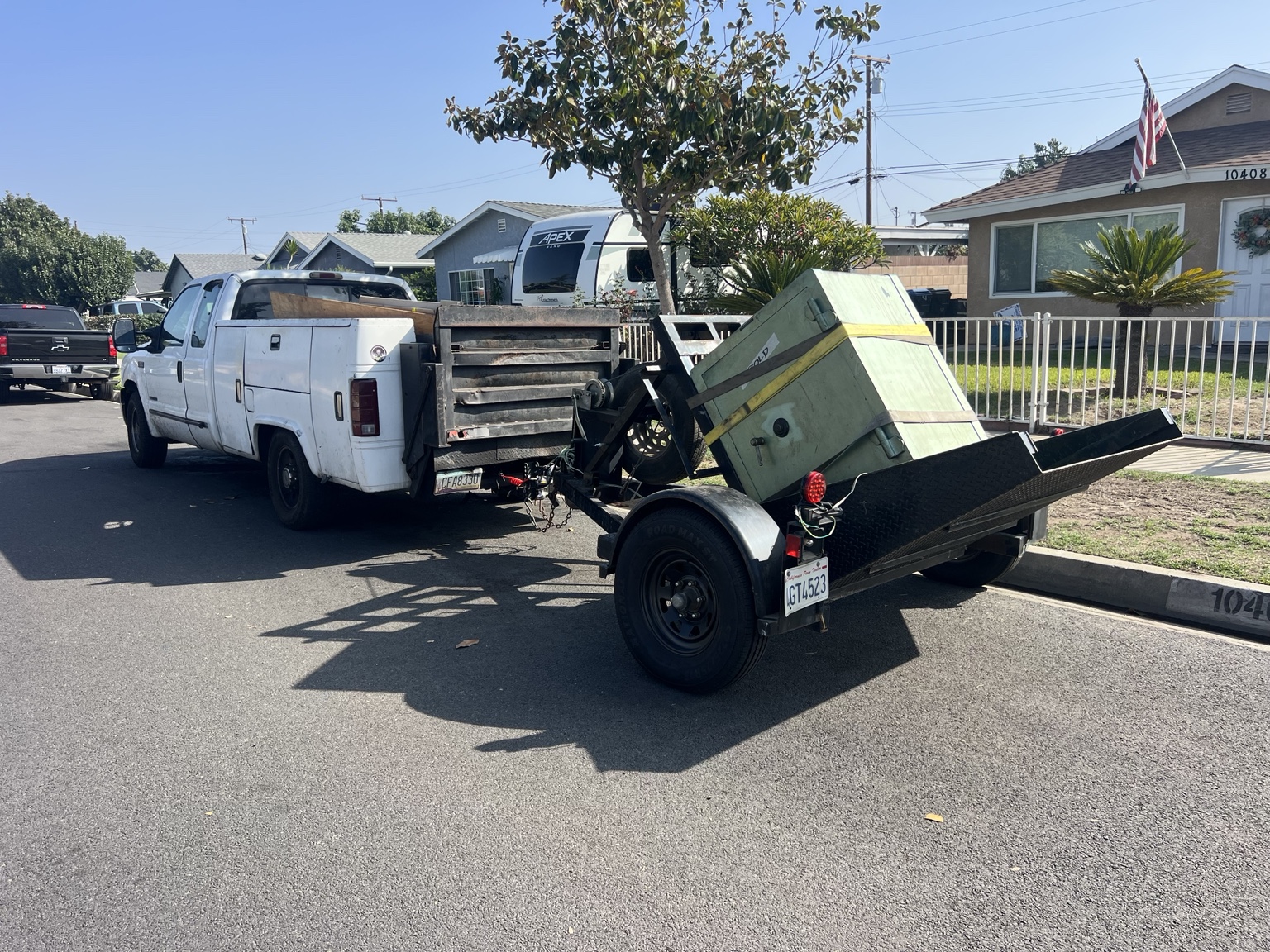 Velasco Lock and Safe truck and trailer transporting a large safe